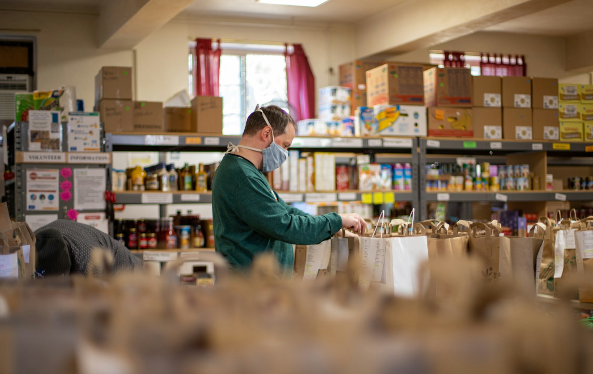 Volunteer sorting packages